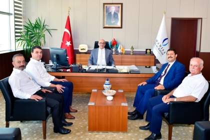 DEMİRCİ HEYETİ, REKTÖR PROF. DR. AHMET ATAÇ'I ZİYARET ETTİ